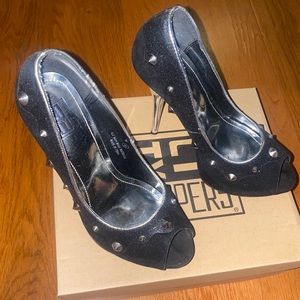 Black Suede heel in a size 8